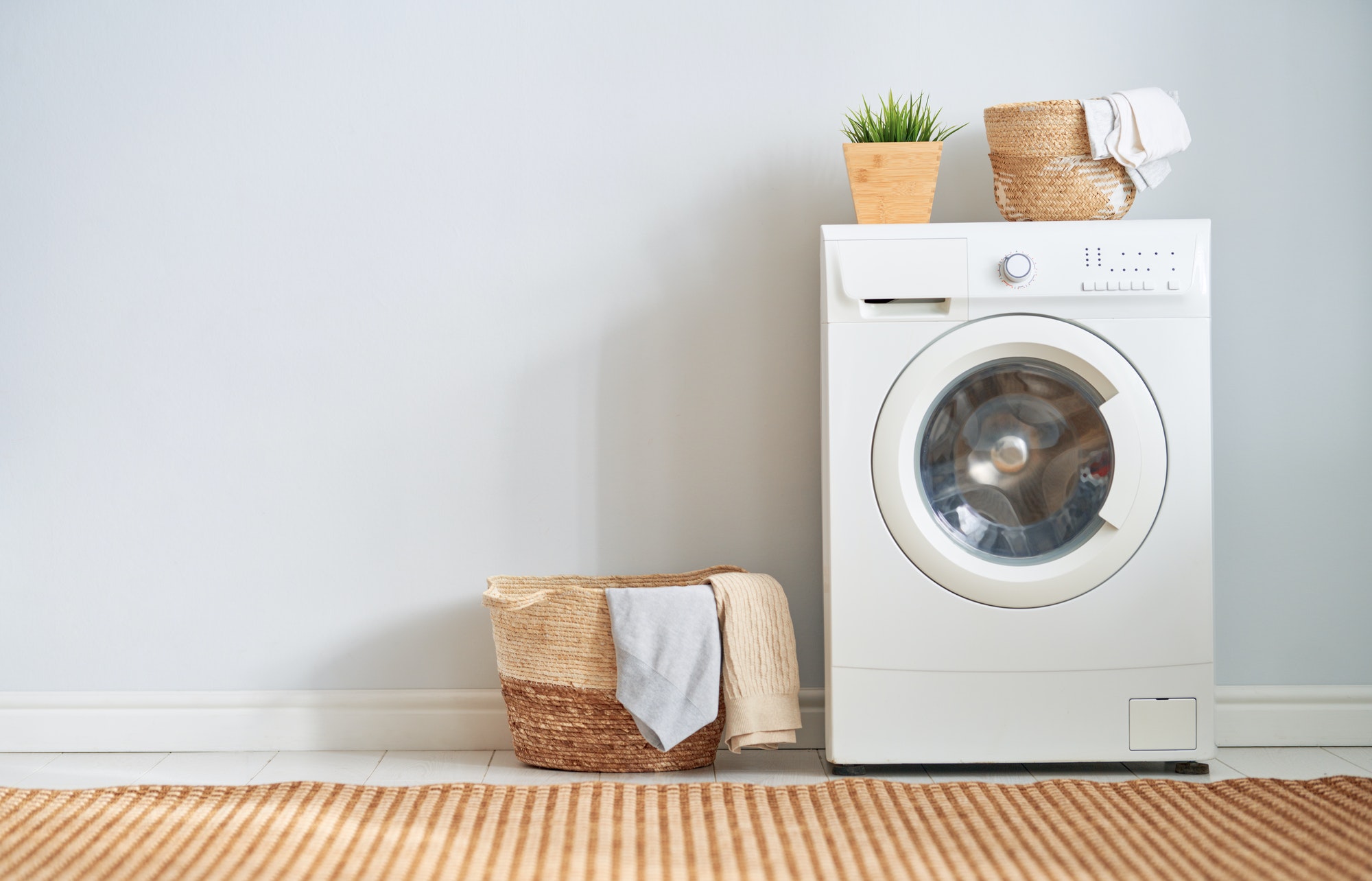 laundry room with a washing machine